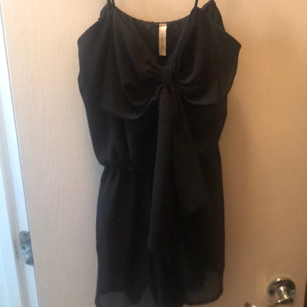 Black romper with bow in front